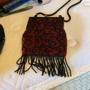 Burgundy and black beaded evening bag with silk cord